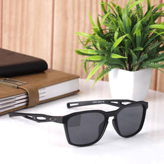 OX ZJ3364 sunglasses with bold black frame and black polarised UV 400 protected lenses. Unisex design, 55 mm size, reduces glare and suits all face shapes. Available now at JUO INDIA.