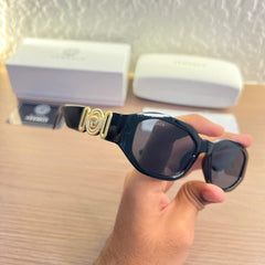Versace 5999 Black Women Sunglass with black frame and gold temple design