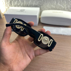 Versace 5999 Black Women Sunglass with black frame and gold temple design