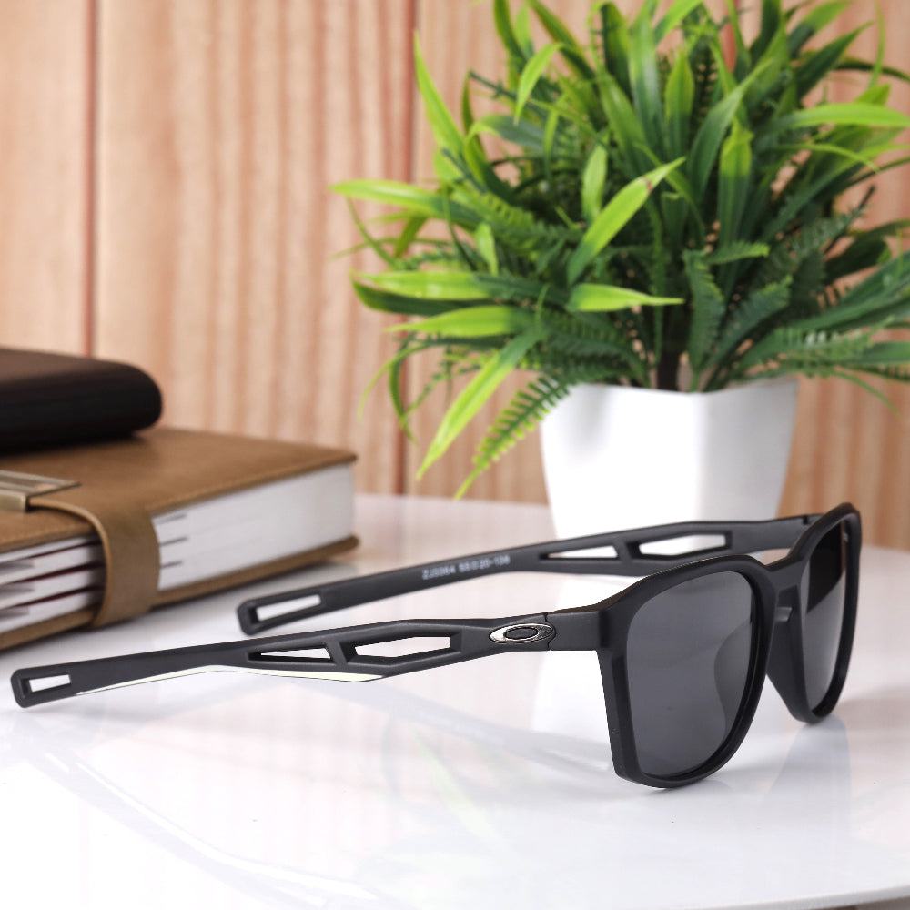 OX ZJ3364 sunglasses with bold black frame and black polarised UV 400 protected lenses. Unisex design, 55 mm size, reduces glare and suits all face shapes. Available now at JUO INDIA.