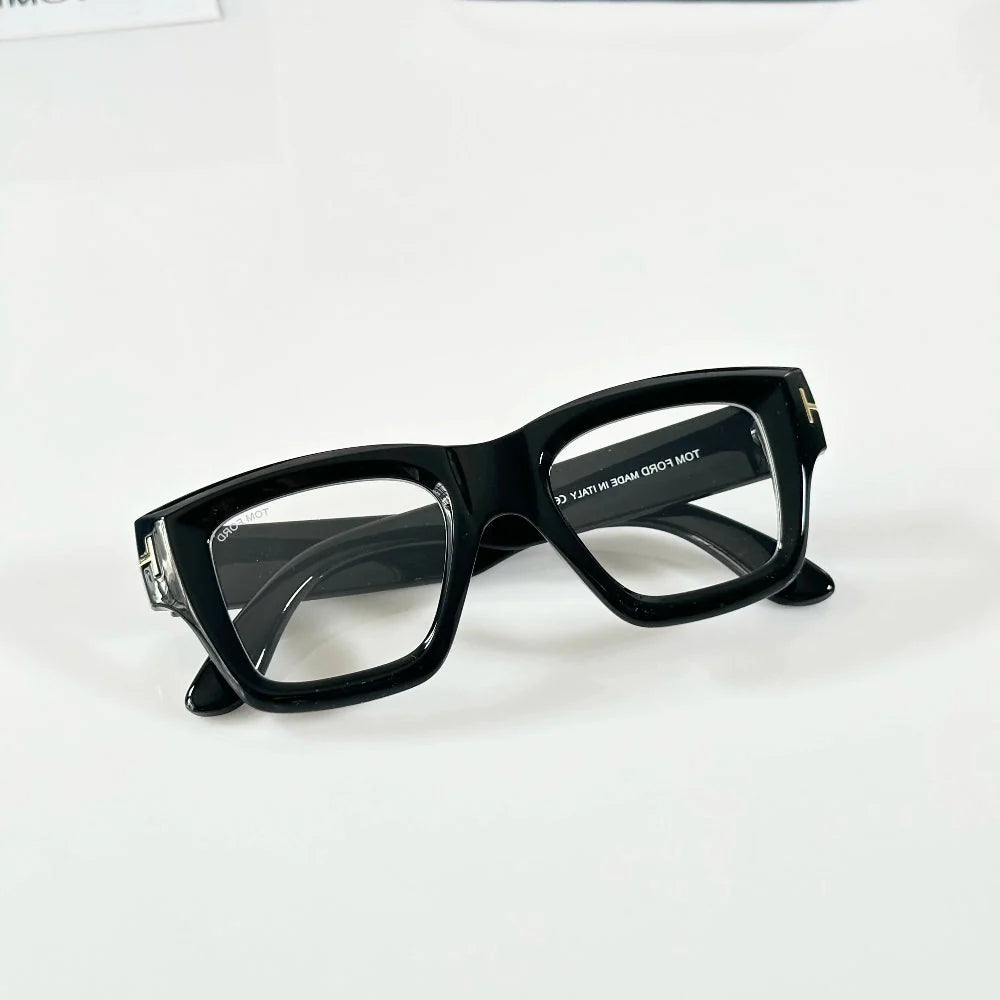 T0m F0rd 184 Black-Clear Sunglass (Shining) with glossy black frame and clear lenses. Premium design with UV400 protection for a classy everyday look.