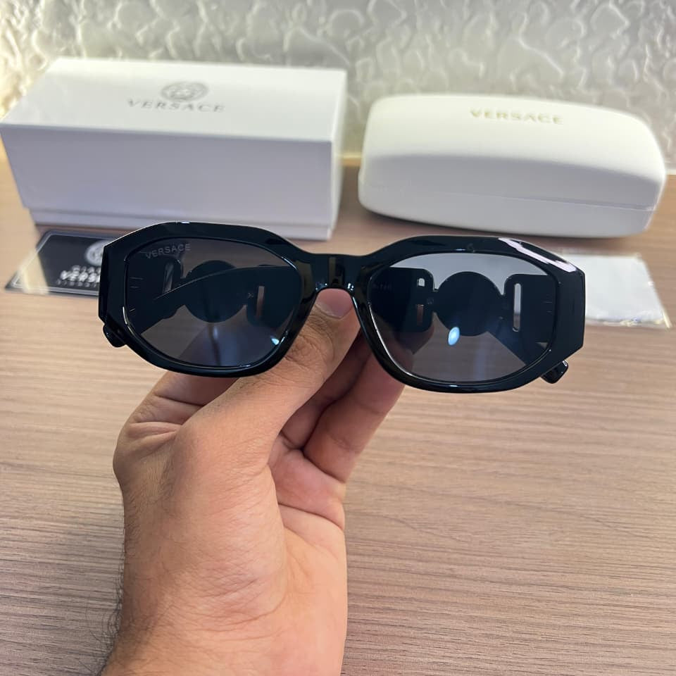 Versace 5999 Black Women Sunglass with black frame and gold temple design