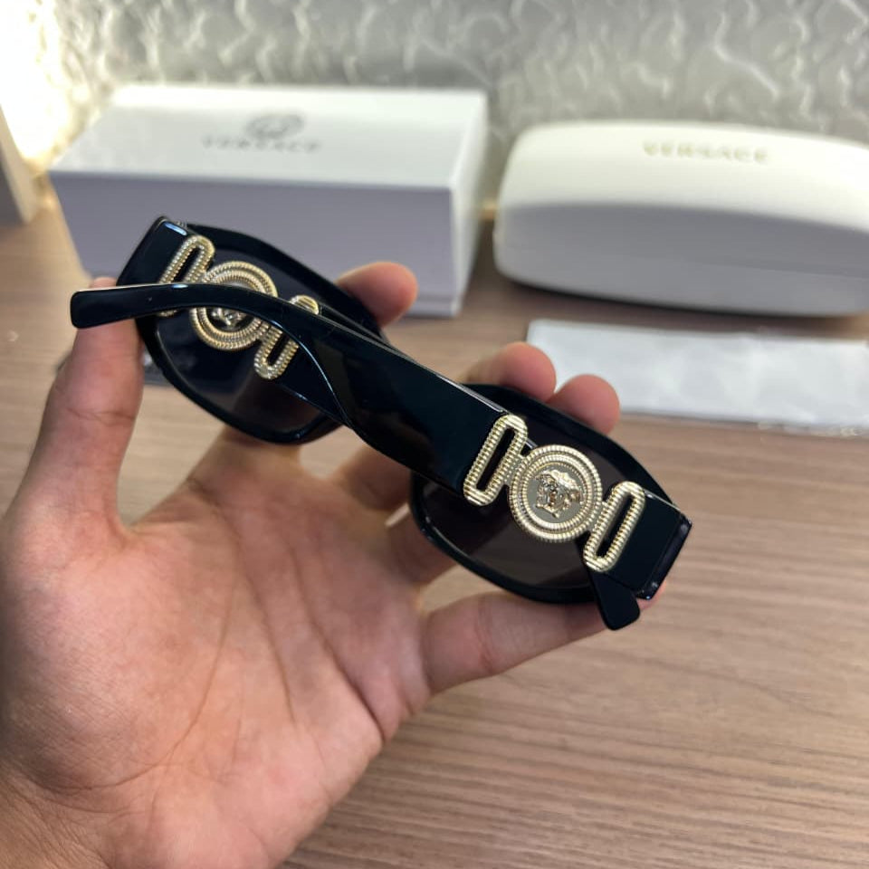 Versace 5999 Black Women Sunglass with black frame and gold temple design